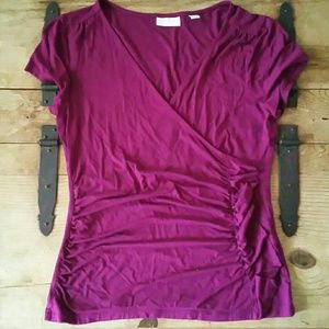 Fushia gathered sides with ruffle V neck top.